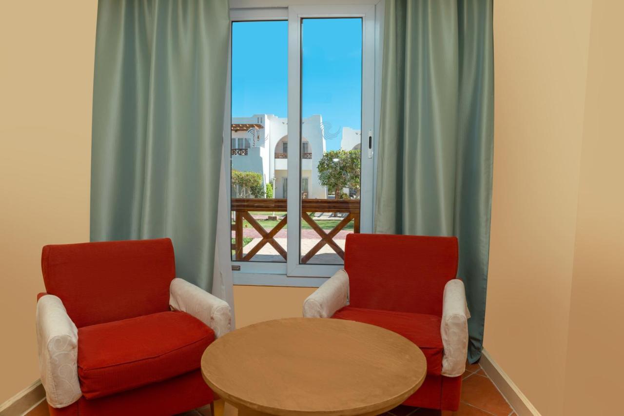 Sharm Dreams Vacation Club - Aqua Park Hotel Kültér fotó A room at the hotel