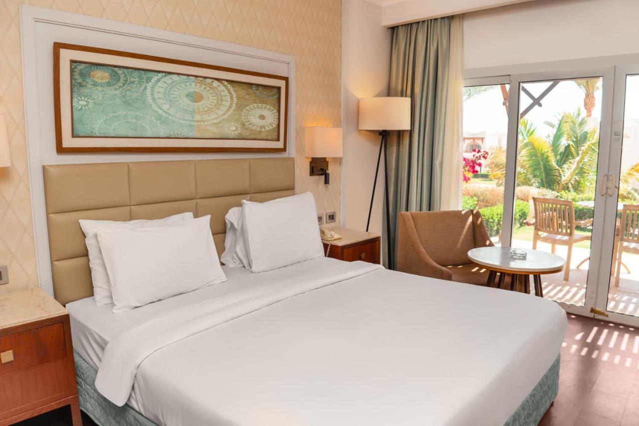 Sharm Dreams Vacation Club - Aqua Park Hotel Kültér fotó A room at the Hilton Sharm El Sheikh