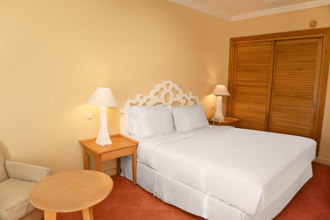Sharm Dreams Vacation Club - Aqua Park Hotel Kültér fotó A bedroom
