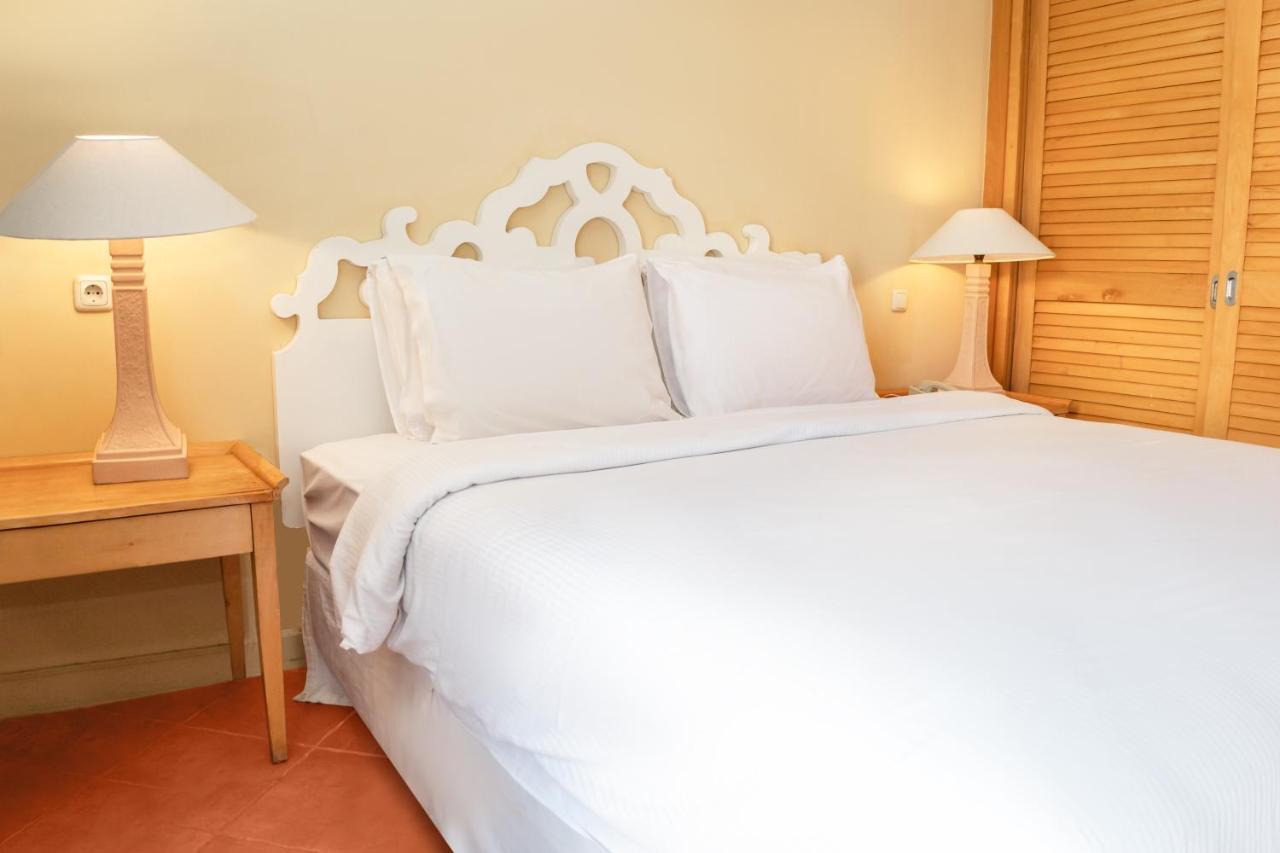 Sharm Dreams Vacation Club - Aqua Park Hotel Kültér fotó A bed