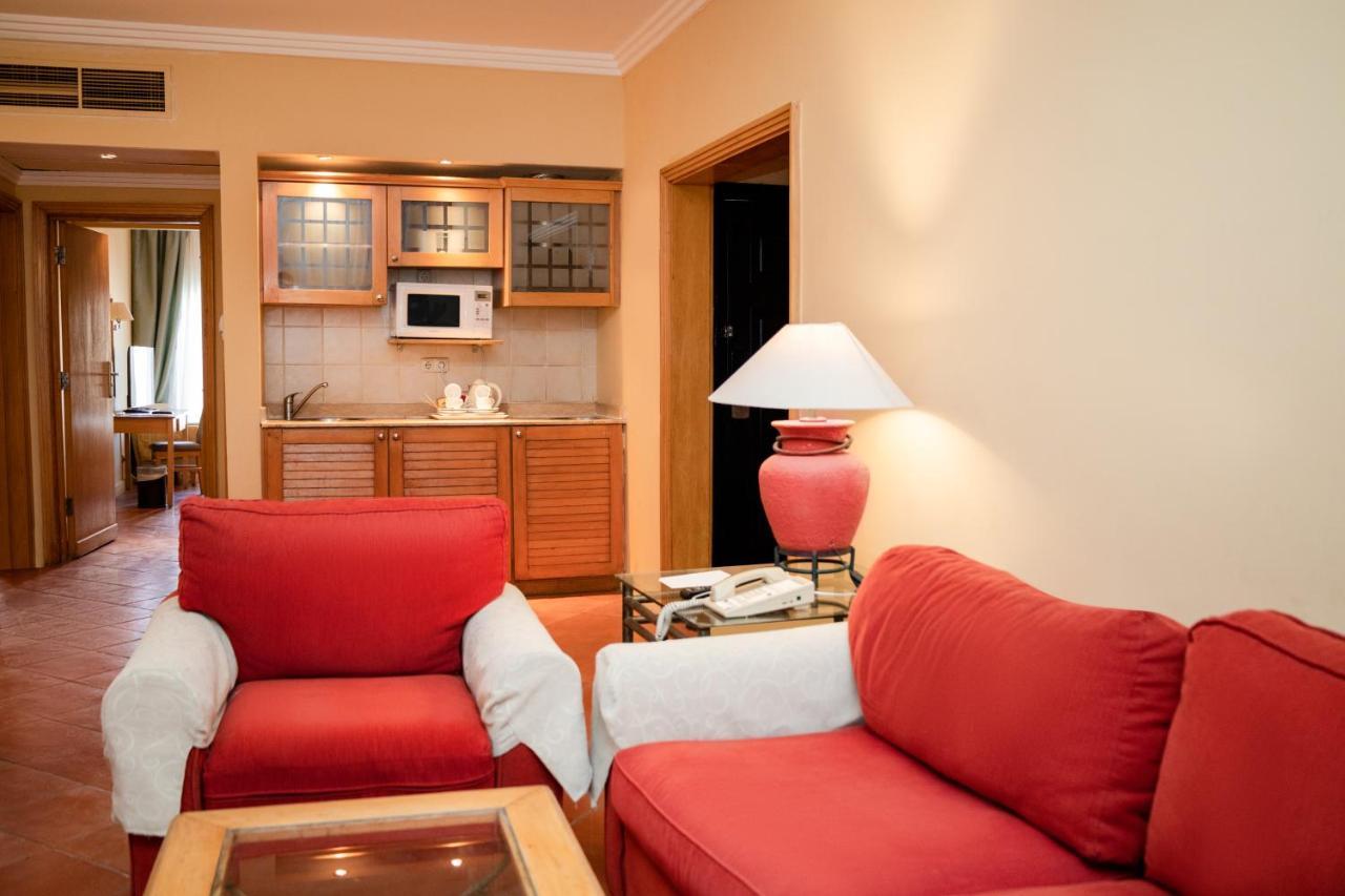 Sharm Dreams Vacation Club - Aqua Park Hotel Kültér fotó A living room with a kitchenette