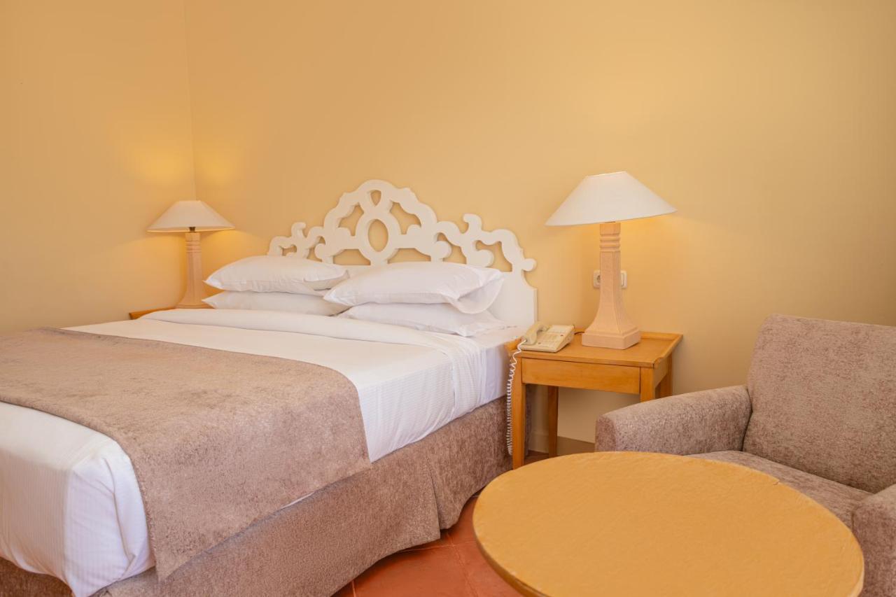 Sharm Dreams Vacation Club - Aqua Park Hotel Kültér fotó A bedroom at the hotel